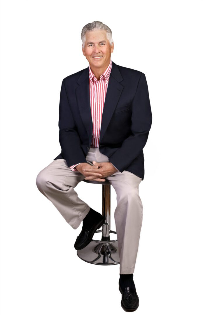 Person in a suit and striped shirt