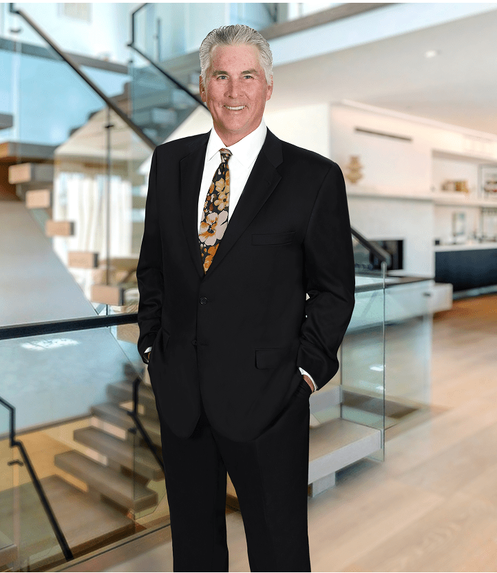 Man in suit standing in modern interior